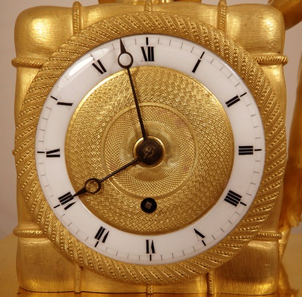 A small English Antique Regency nautical themed mantel clock Ian